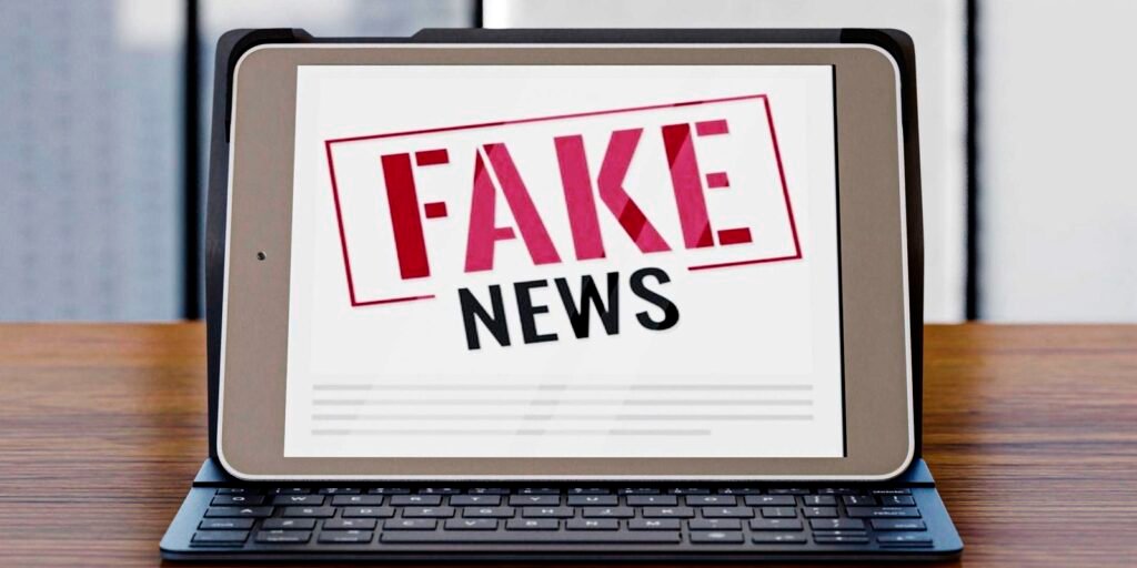 front-view-laptop-desk-with-fake-news_0.jpg